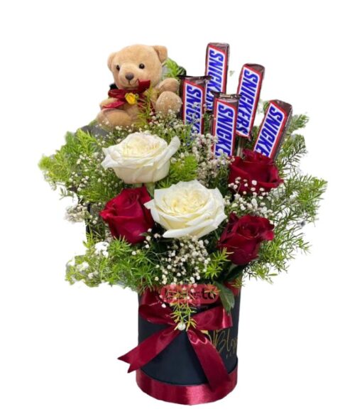 Roses with chocolates bouquet.”